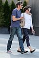 milla jovovich paul ws anderson hold hands in toronto 01