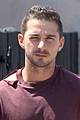 shia labeouf lifts his shirt bares torso 04