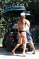 shirtless gerard butler goes surfing with woman 13