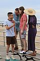 rami malek christian slater do a beachside photo shoot 14