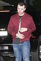 sam smith laughs with friends post dinner 05