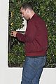 sam smith laughs with friends post dinner 06