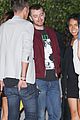 sam smith laughs with friends post dinner 10