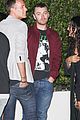 sam smith laughs with friends post dinner 24