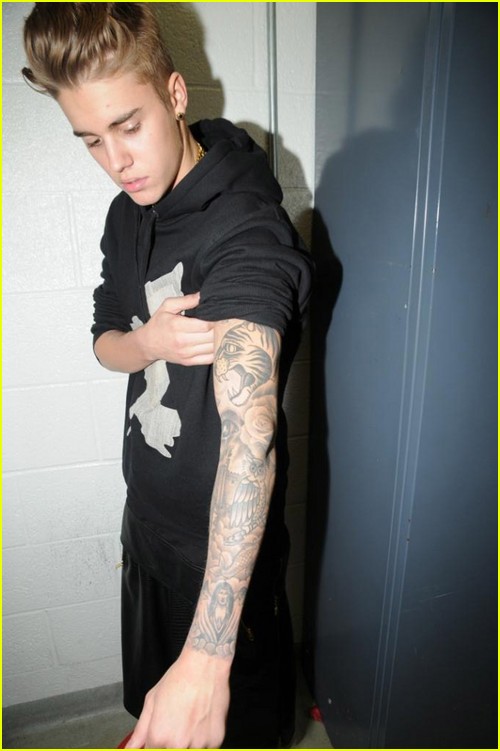 Photos documenting Justin Bieber's tattoos from arrest in 2014