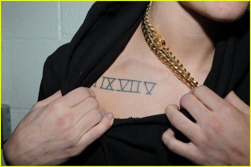 Photos documenting Justin Bieber's tattoos from arrest in 2014